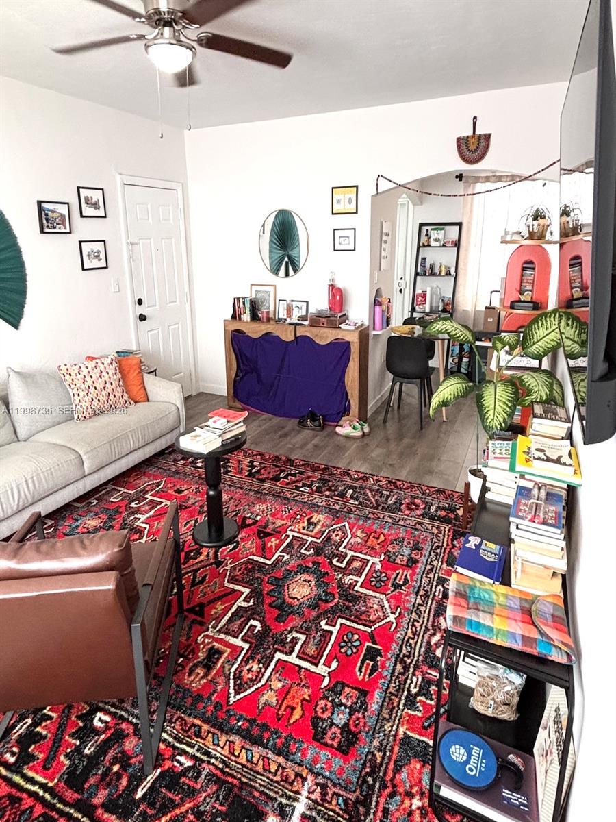 740 Southwest 7th Street, Unit 3 Miami, FL 33130 - Photo 2 of 10 a living room with lots of furniture and a couch