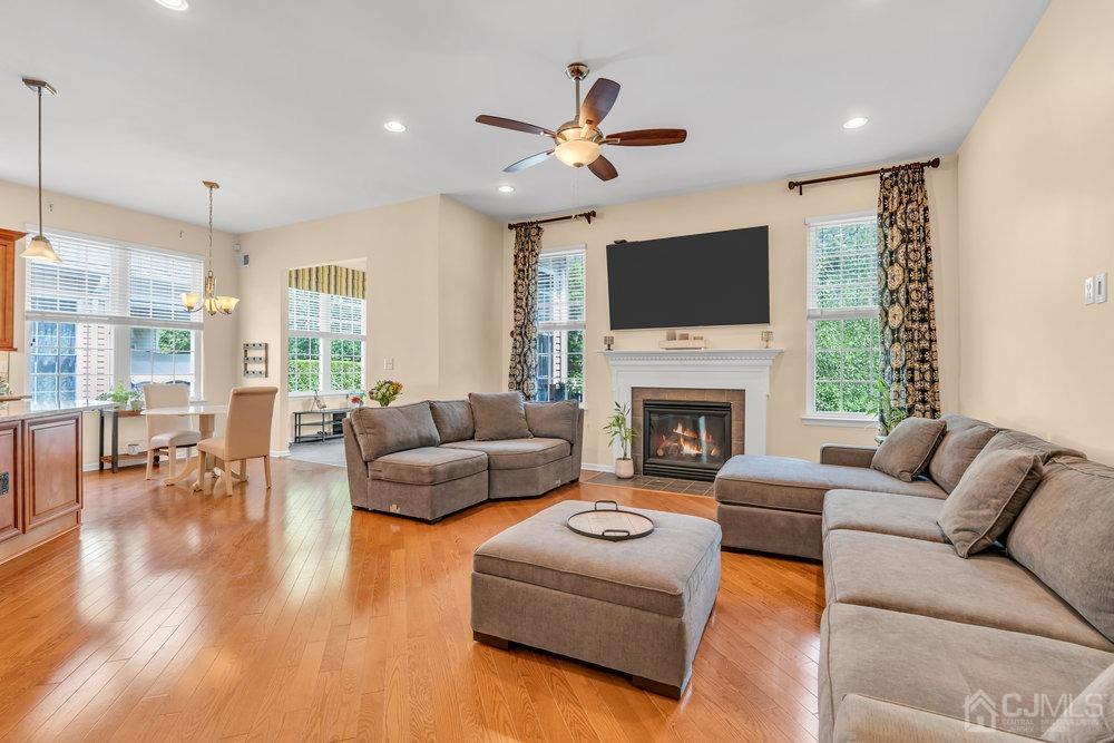 66 Kings Mill Road Monroe Township, NJ 08831 - Photo 17 of 56 a living room with furniture fireplace and flat screen tv