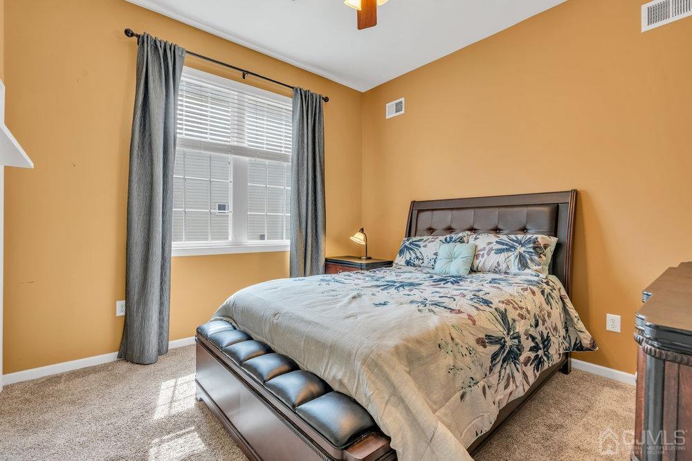 66 Kings Mill Road Monroe Township, NJ 08831 - Photo 30 of 56 a bedroom with a bed and window