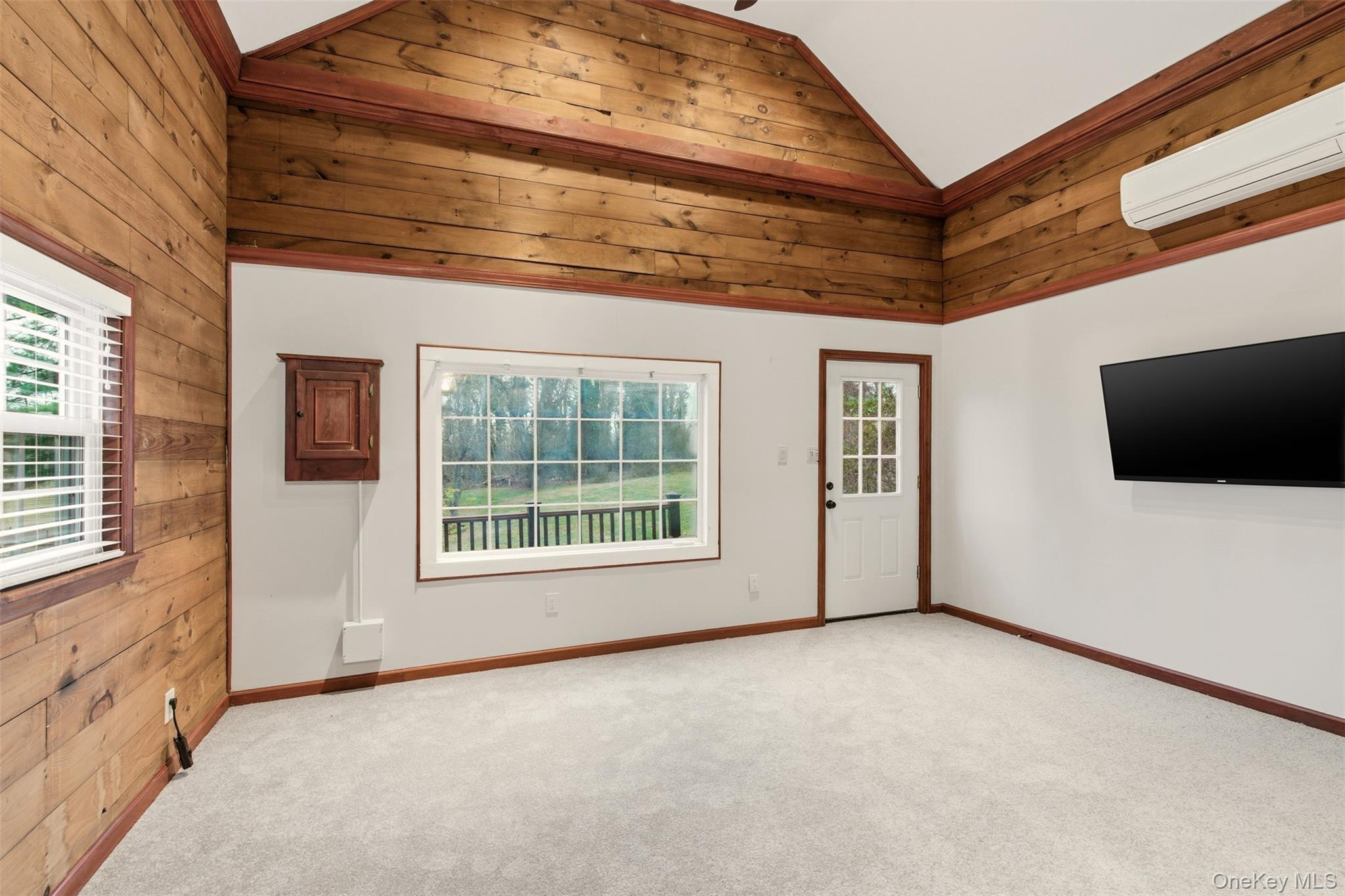 327 West Neck Road Lloyd Harbor, NY 11743 - Photo 18 of 24 a view of an empty room with a window