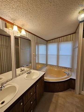 a bathroom with a toilet and a sink