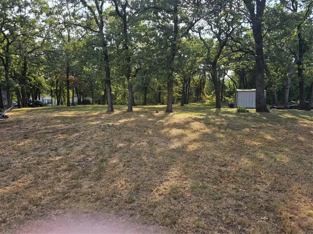 a house with trees in front of it