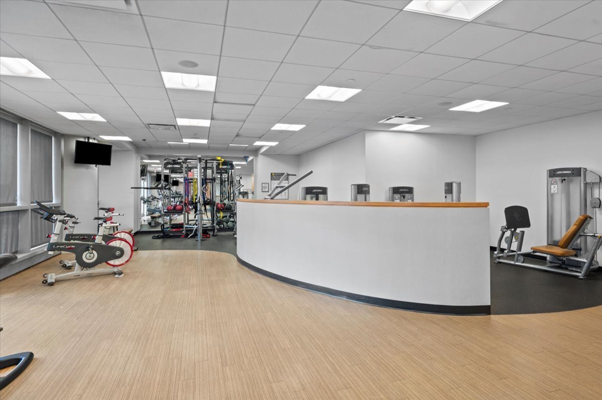 127 Greyrock Place, Unit 810 Stamford, CT 06901 - Photo 28 of 34 a view of a room with gym equipment