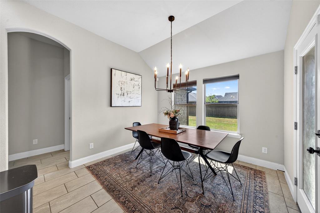 3245 Ribisl Lane Royse City, TX 75189 - Photo 11 of 39 a view of a dining room with furniture and window
