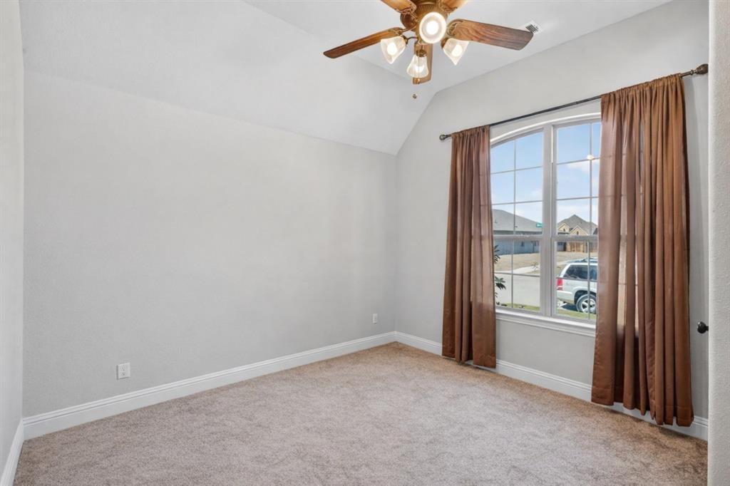3245 Ribisl Lane Royse City, TX 75189 - Photo 13 of 39 an empty room with windows and closet