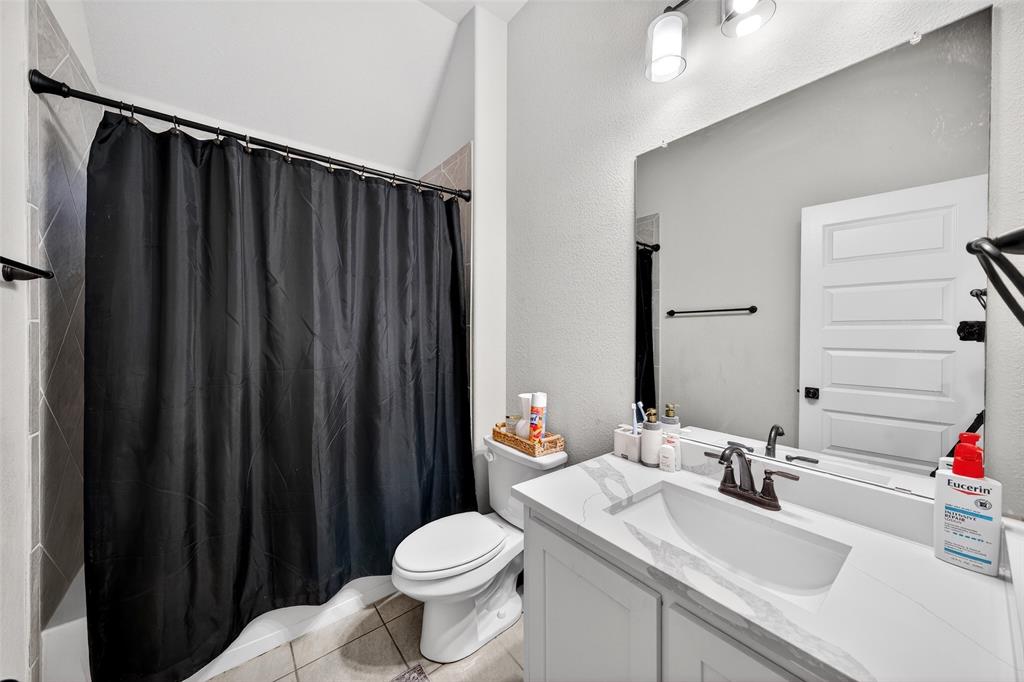 3245 Ribisl Lane Royse City, TX 75189 - Photo 16 of 39 a bathroom with a sink and a toilet