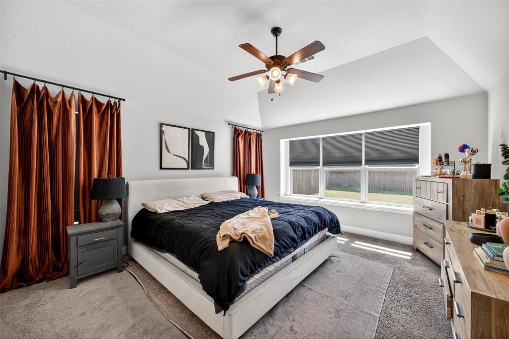 3245 Ribisl Lane Royse City, TX 75189 - Photo 17 of 39 a bedroom with a bed and a window
