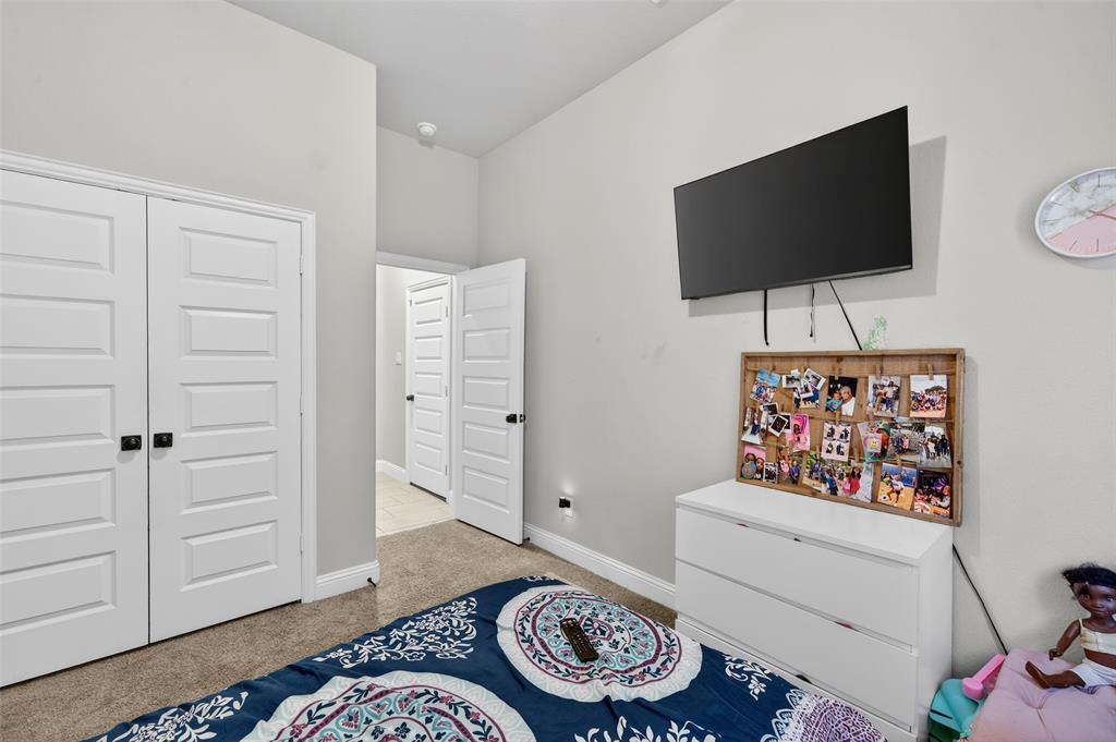 3245 Ribisl Lane Royse City, TX 75189 - Photo 23 of 39 a living room with furniture and a flat screen tv