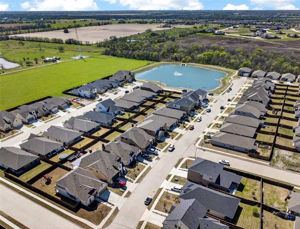 3245 Ribisl Lane Royse City, TX 75189 - Photo 36 of 39 an aerial view of a house with a lake view