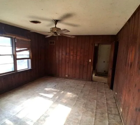 an empty room with windows