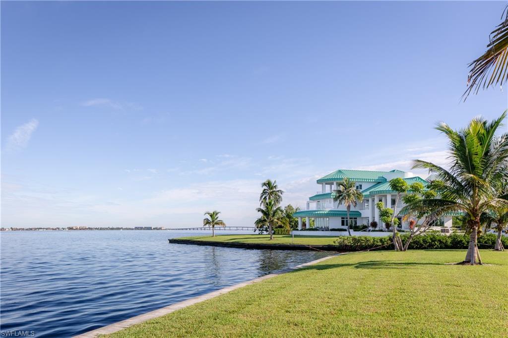14040 Schultz Road Fort Myers, FL 33908 - Photo 12 of 47 a view of a swimming pool with an ocean view