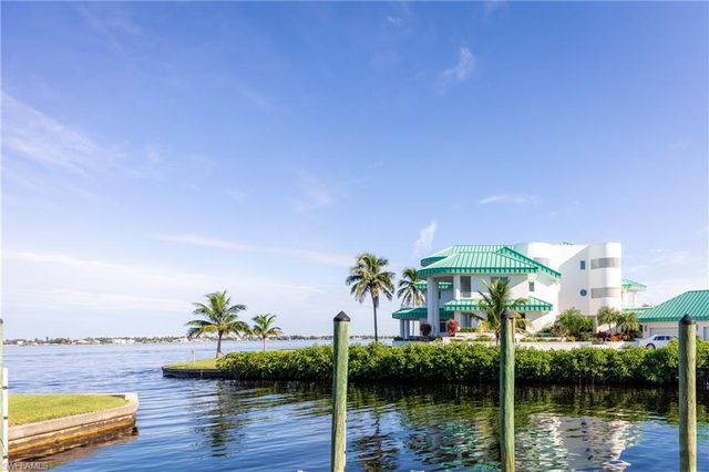 a view of a lake with a city