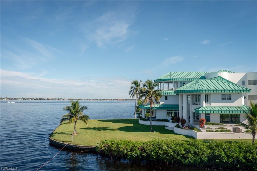 14040 Schultz Road Fort Myers, FL 33908 - Photo 41 of 47 swimming pool with outdoor seating and yard