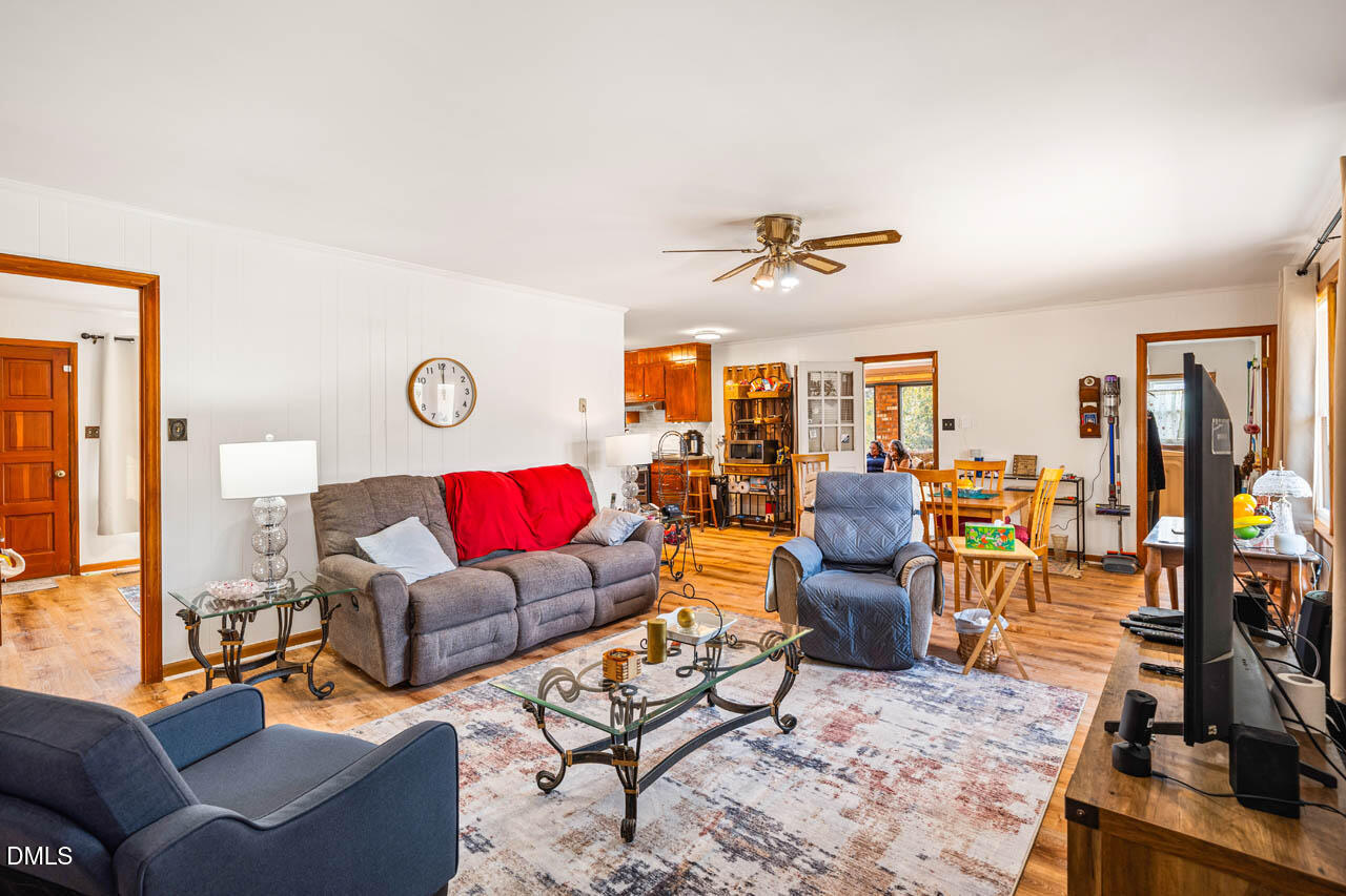 200 Sawmill Road Cedar Grove, NC 27231 - Photo 12 of 72 a living room with furniture kitchen view and a window