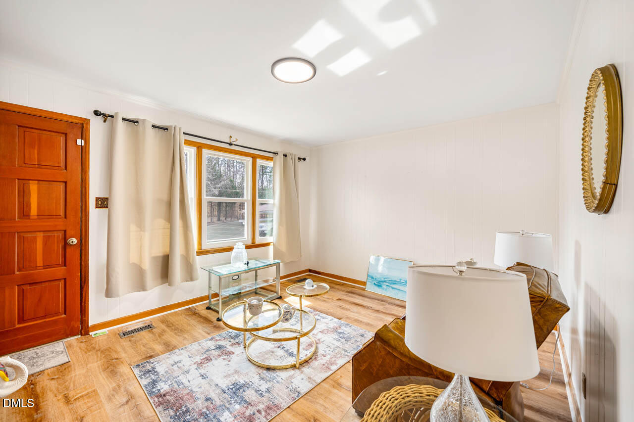 200 Sawmill Road Cedar Grove, NC 27231 - Photo 14 of 72 a bedroom with furniture and a window