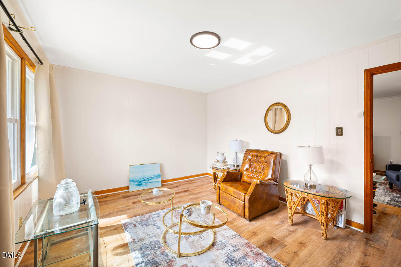 200 Sawmill Road Cedar Grove, NC 27231 - Photo 15 of 72 a living room with furniture and a table