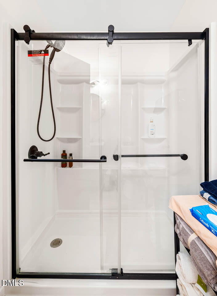 200 Sawmill Road Cedar Grove, NC 27231 - Photo 17 of 72 a bathroom with a shower