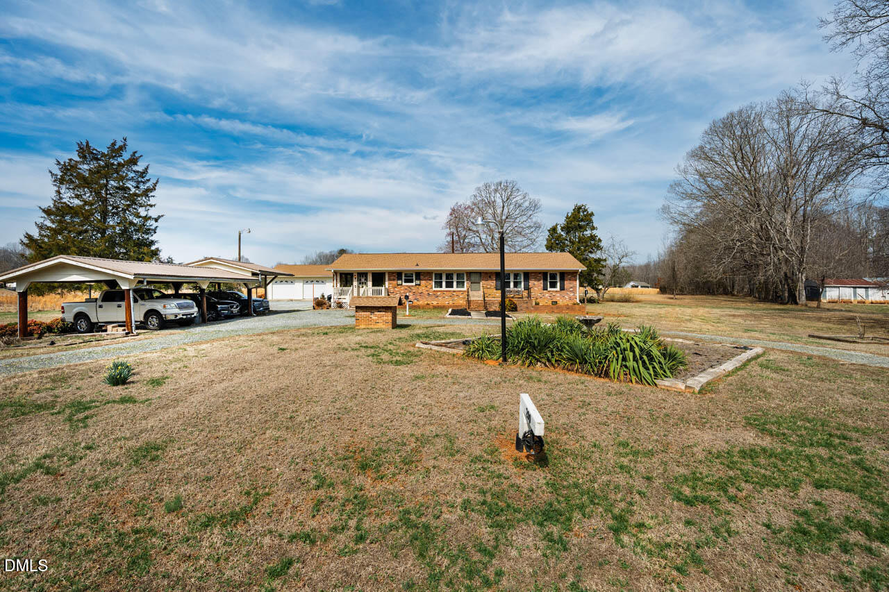 200 Sawmill Road Cedar Grove, NC 27231 - Photo 34 of 72 a view of street with parked cars