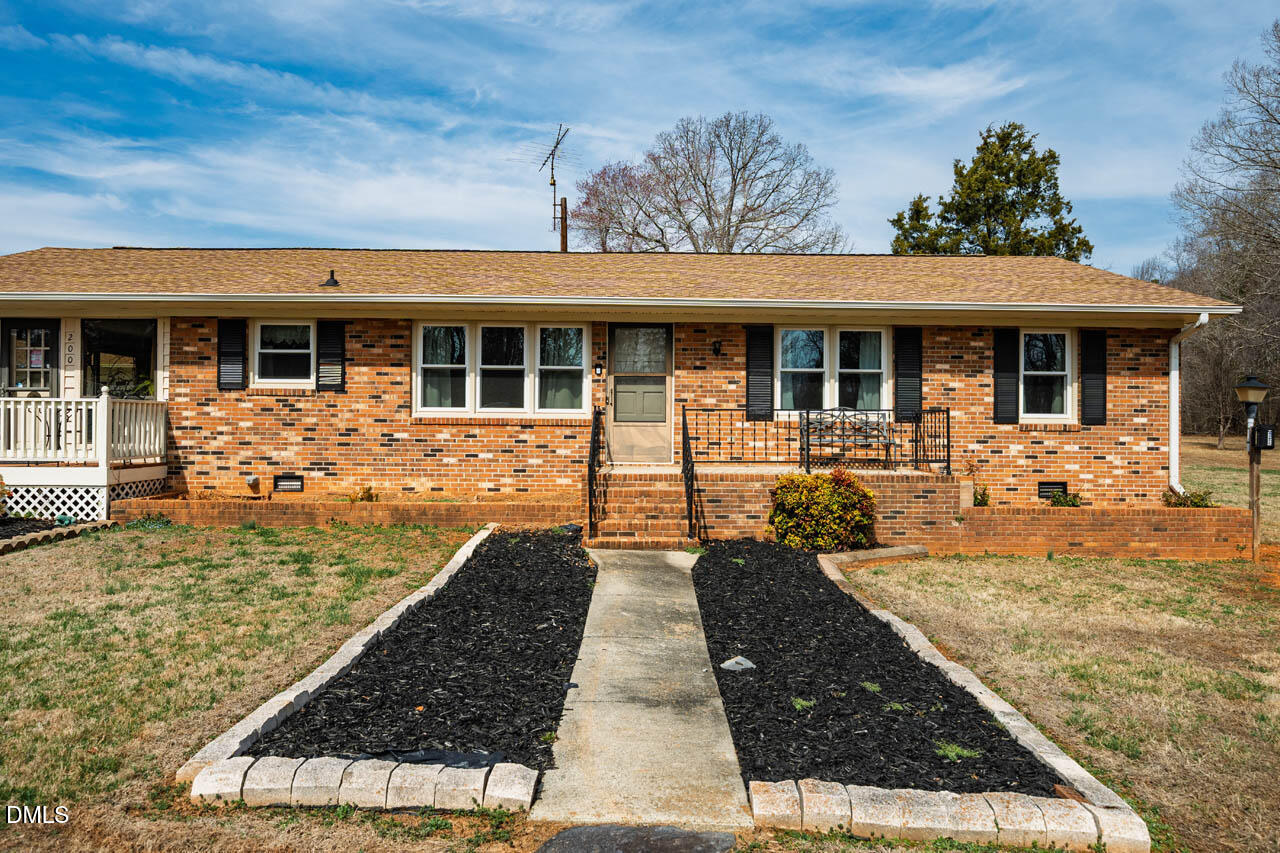 200 Sawmill Road Cedar Grove, NC 27231 - Photo 36 of 72 front view of a house with a porch