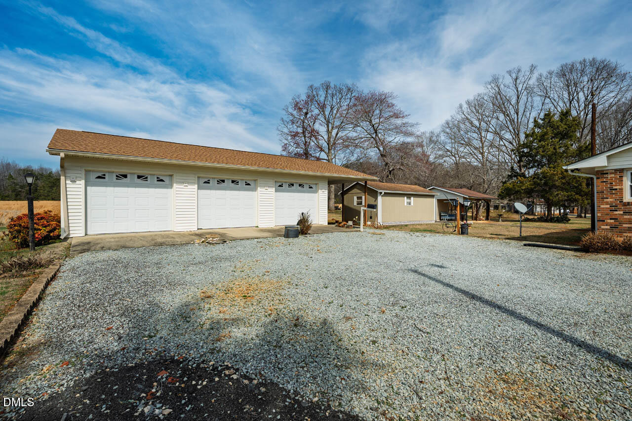 200 Sawmill Road Cedar Grove, NC 27231 - Photo 46 of 72 a view of a house with a outdoor space