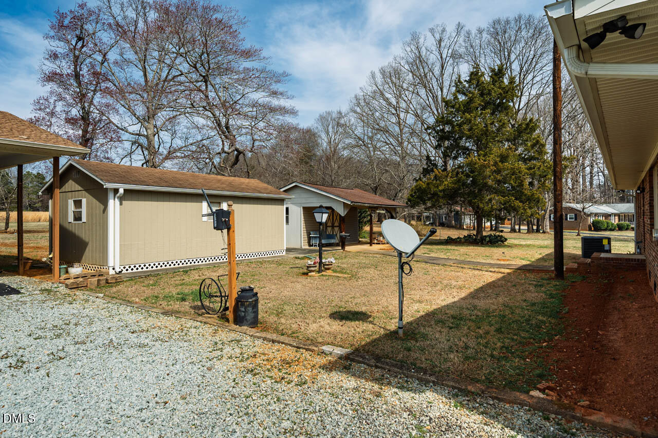 200 Sawmill Road Cedar Grove, NC 27231 - Photo 47 of 72 a view of a house with snow on the road