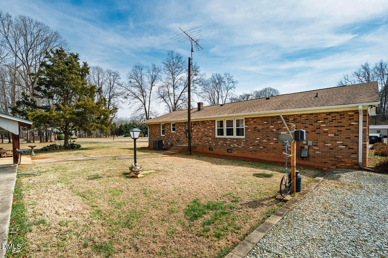 200 Sawmill Road Cedar Grove, NC 27231 - Photo 48 of 72 a view of a house with snow on the road