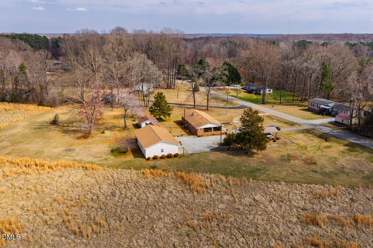 200 Sawmill Road Cedar Grove, NC 27231 - Photo 65 of 72 a view of a town with mountains in the background