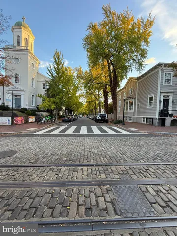 a view of a yard next to a road