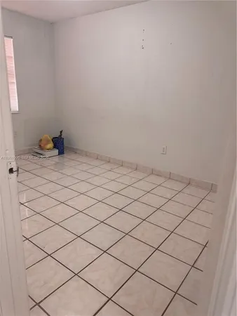 a bathroom with a toilet a sink and bathtub