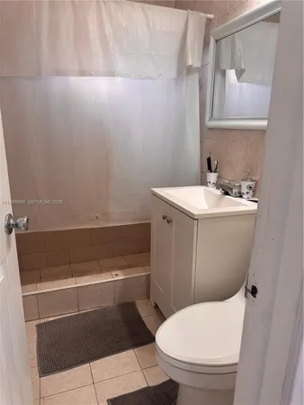 a view of a water with a building in the background