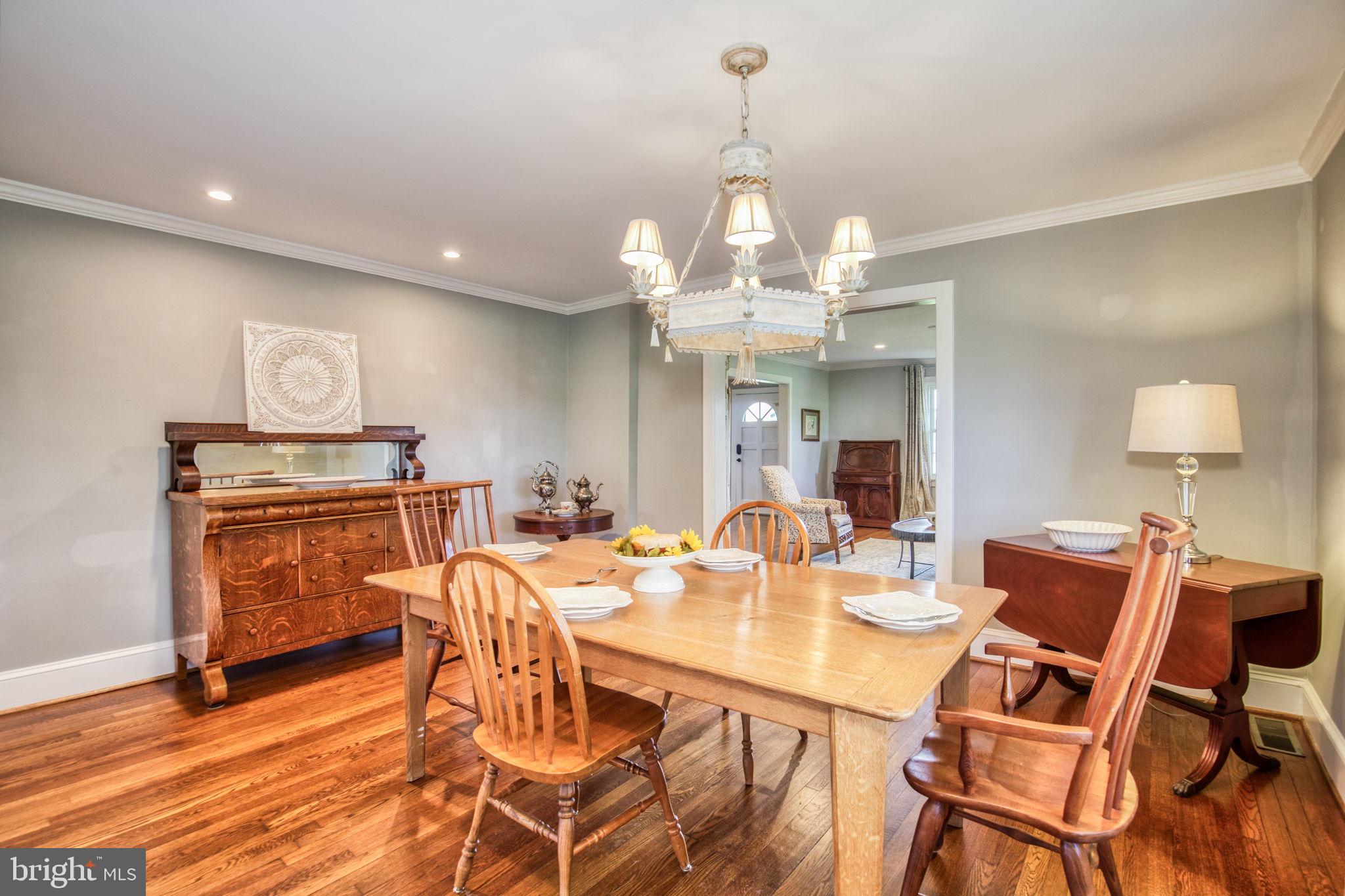 1815 Country Road Beaverdam, VA 23015 - Photo 16 of 92 a view of a dining room with furniture and wooden floor