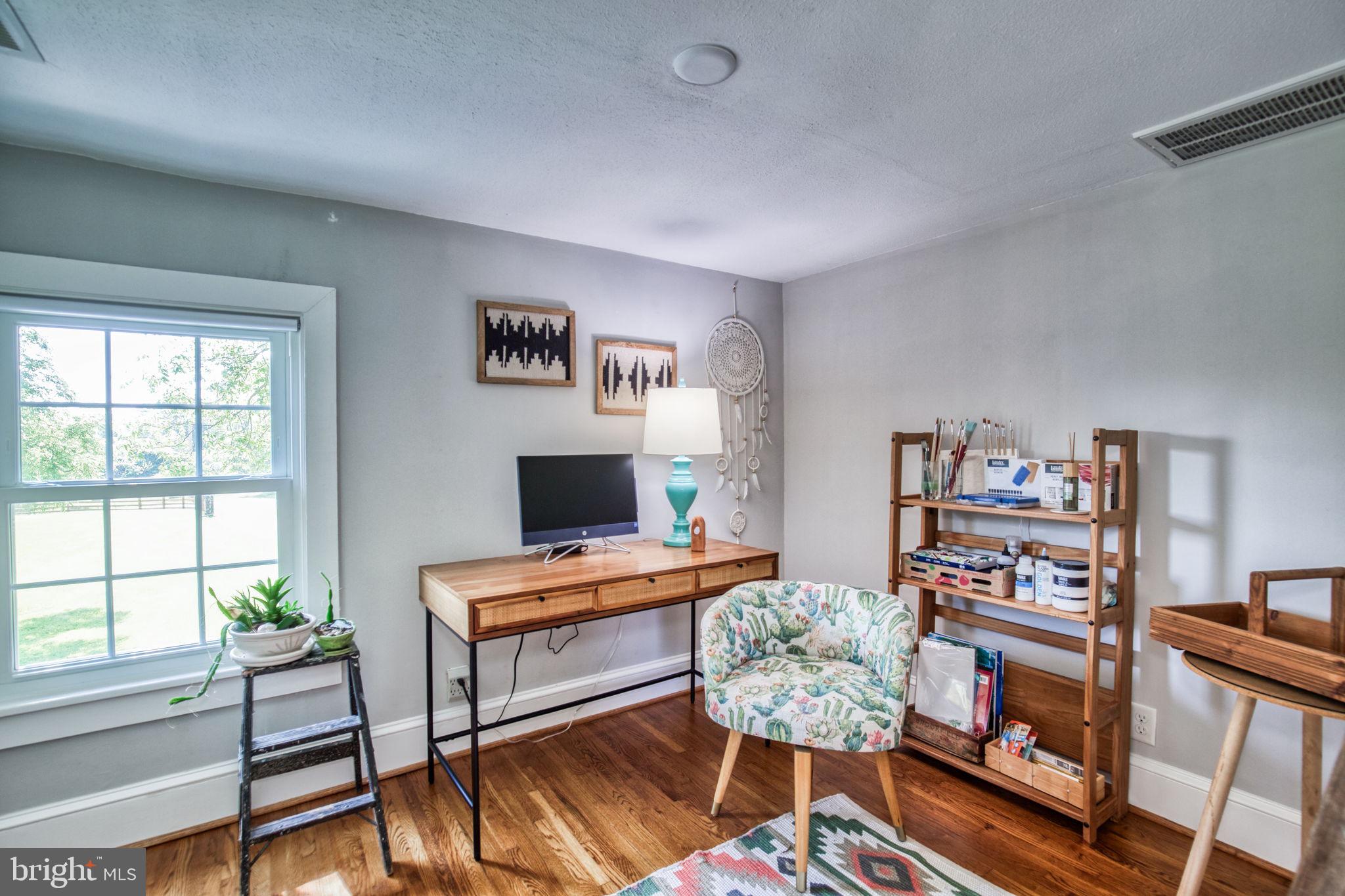 1815 Country Road Beaverdam, VA 23015 - Photo 31 of 92 a living room with furniture and a window