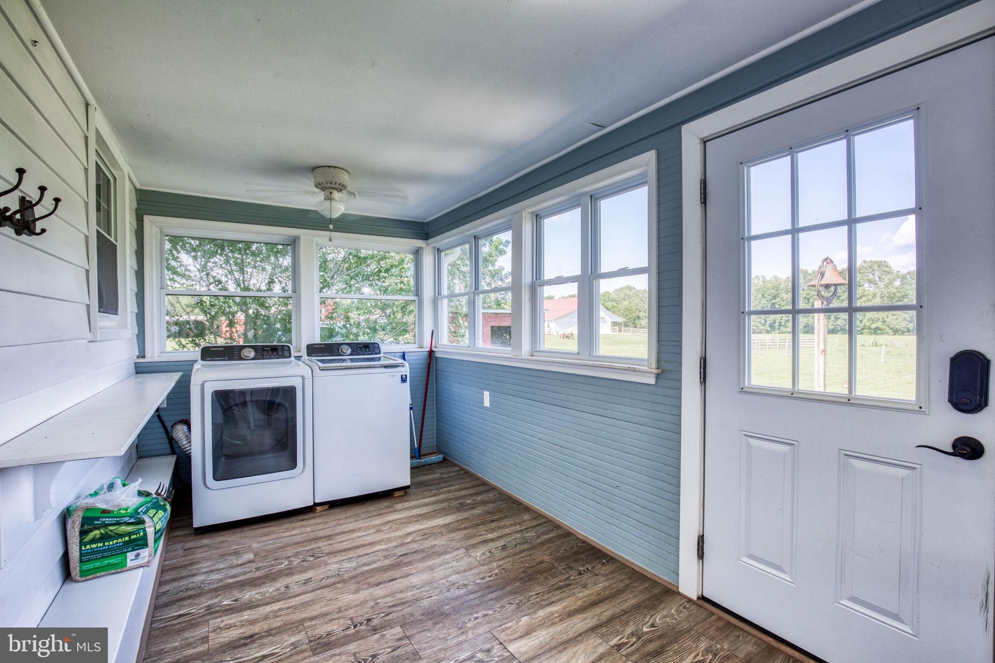 1815 Country Road Beaverdam, VA 23015 - Photo 39 of 92 a kitchen with a stove and wooden cabinets