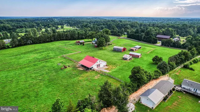 a view of backyard with wooden deck