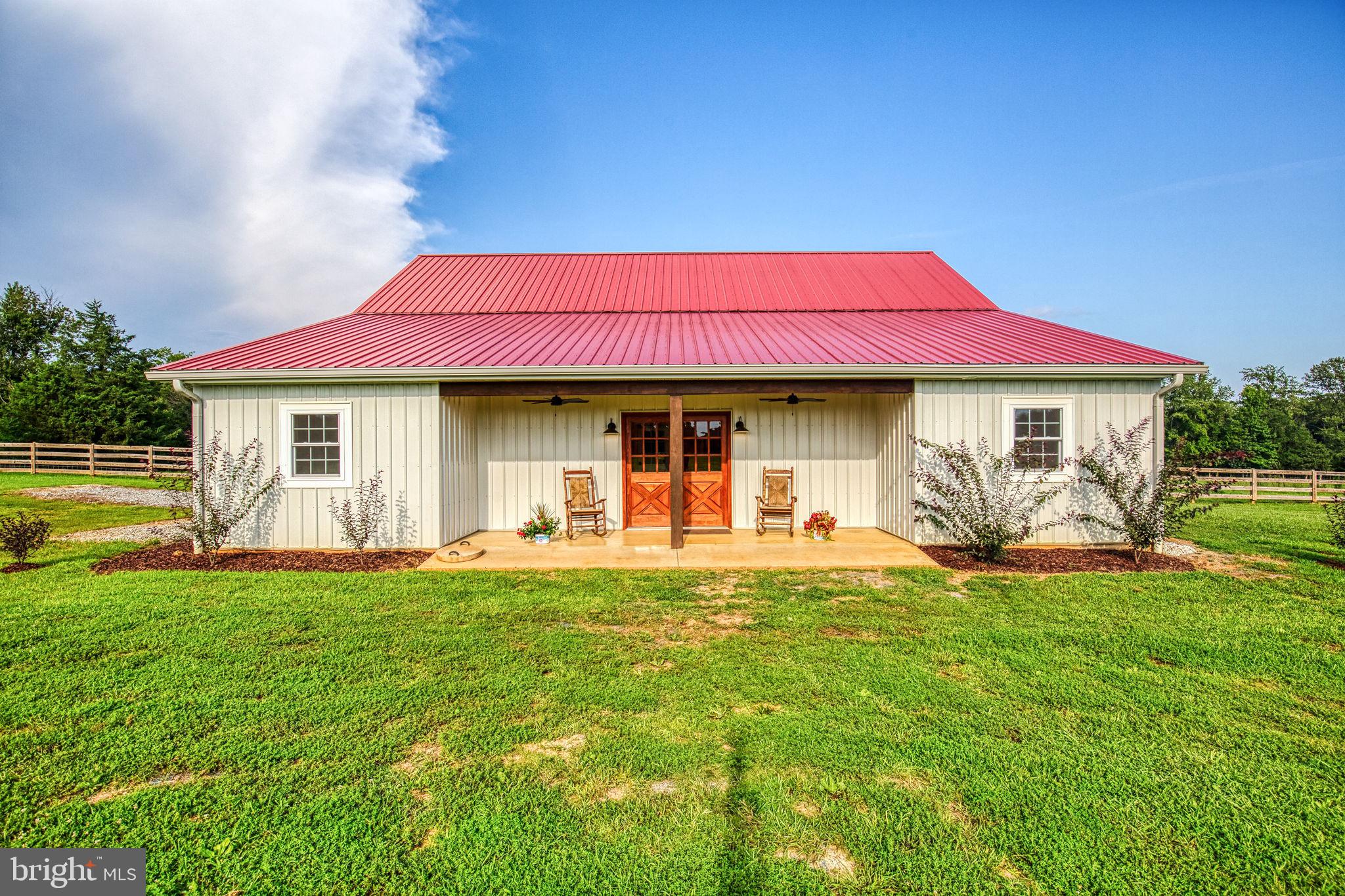 1815 Country Road Beaverdam, VA 23015 - Photo 62 of 92 front view of a house with a swimming pool