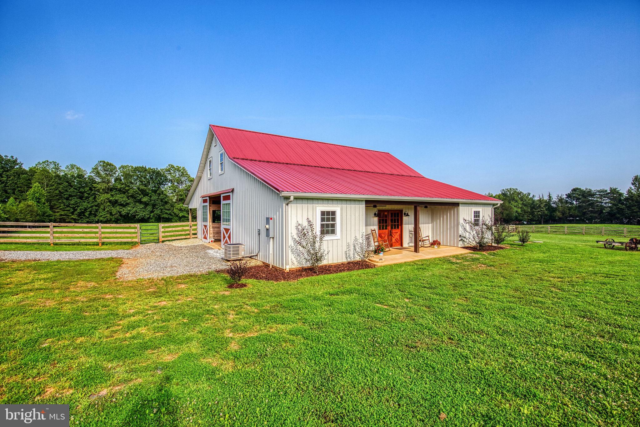 1815 Country Road Beaverdam, VA 23015 - Photo 63 of 92 a front view of a house with swimming pool having outdoor seating