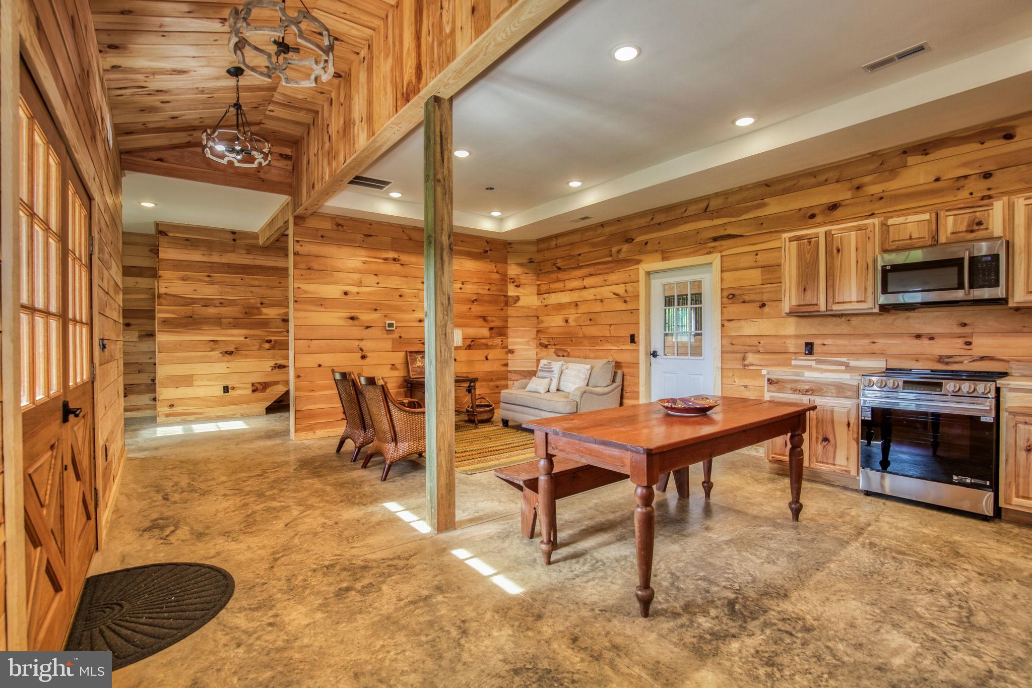 1815 Country Road Beaverdam, VA 23015 - Photo 68 of 92 a living room with patio furniture and a fireplace