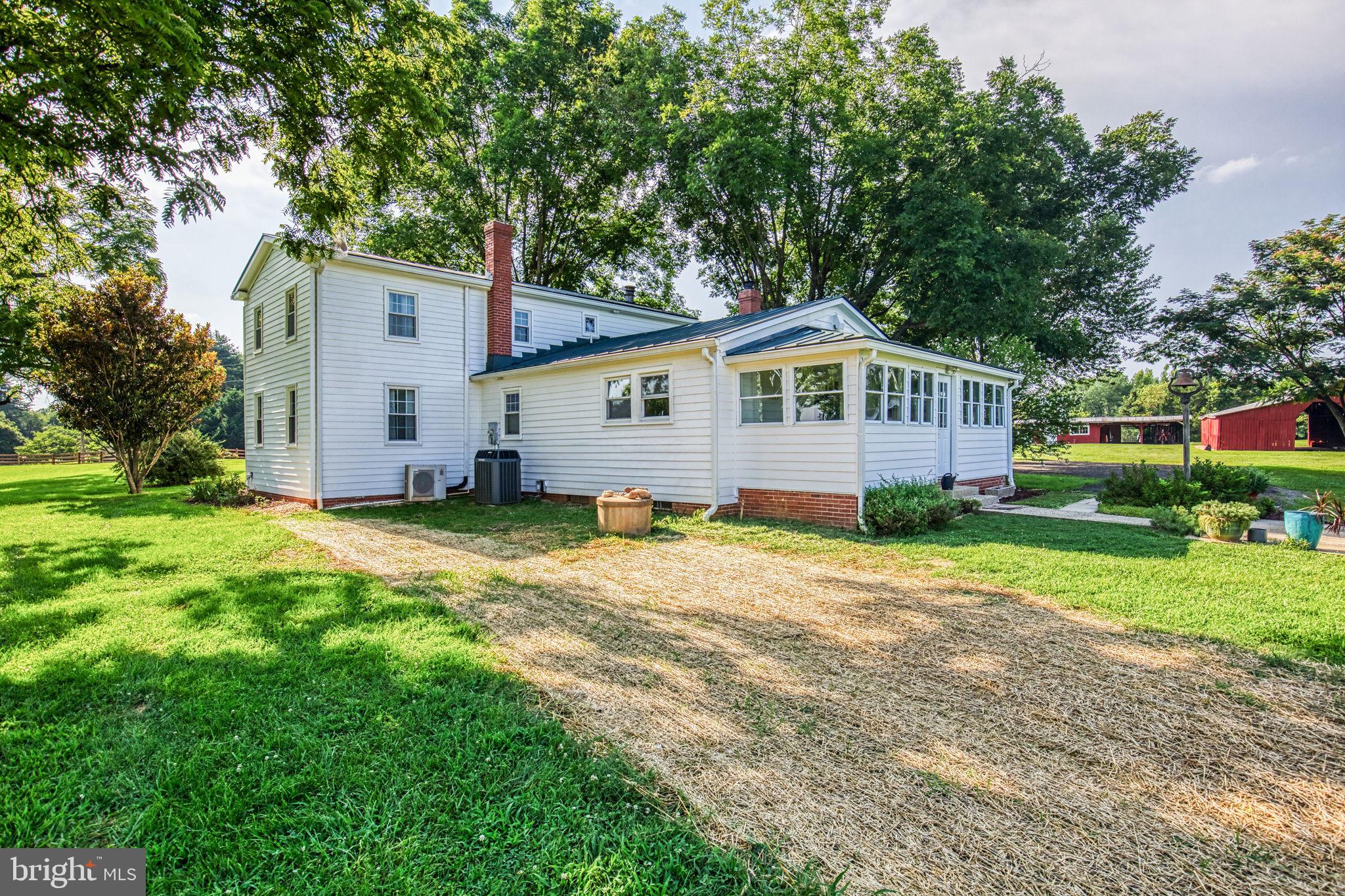 1815 Country Road Beaverdam, VA 23015 - Photo 7 of 92 a view of a house with backyard and trees