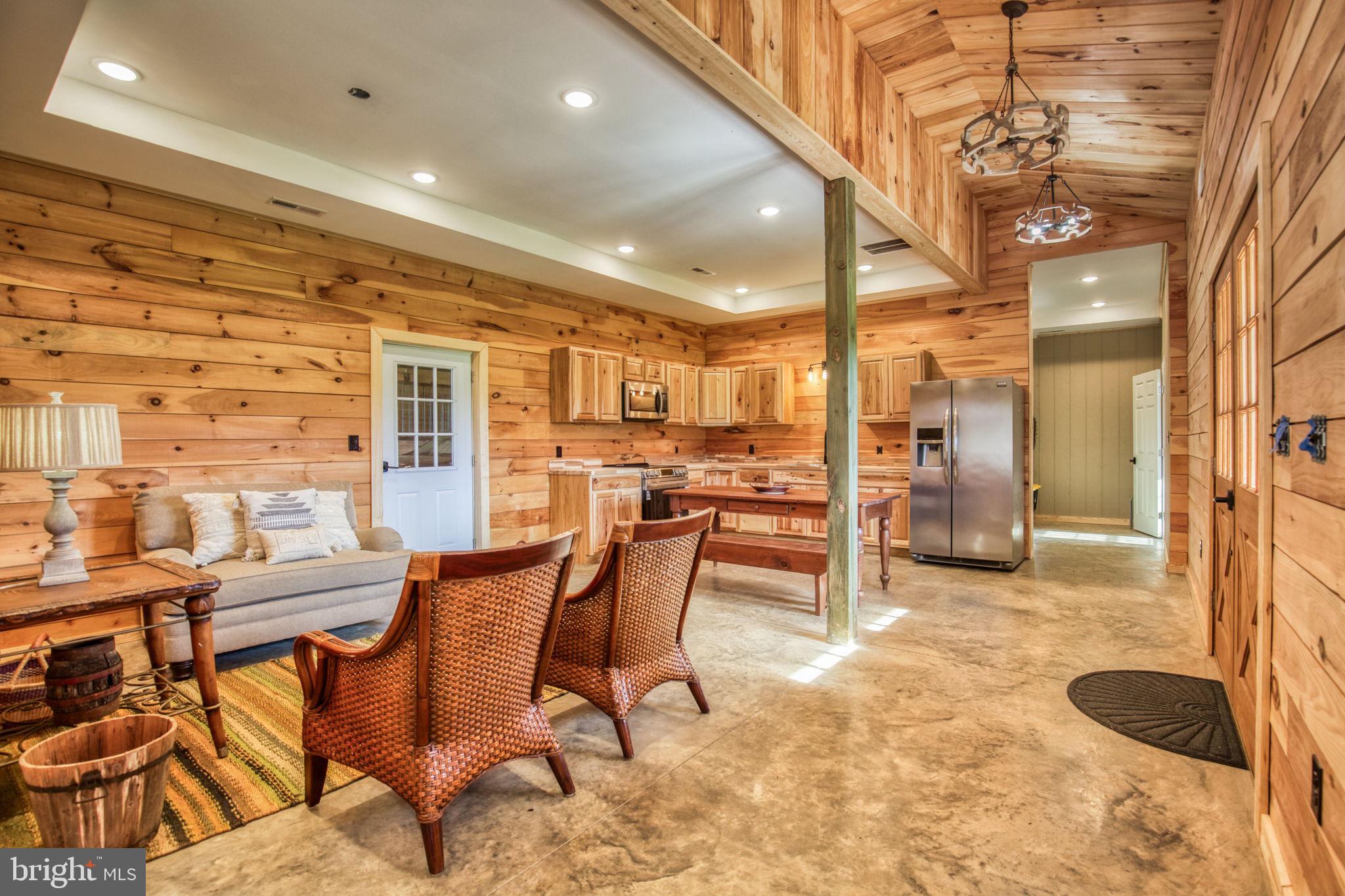 1815 Country Road Beaverdam, VA 23015 - Photo 69 of 92 a view of a dining room with furniture and a chandelier