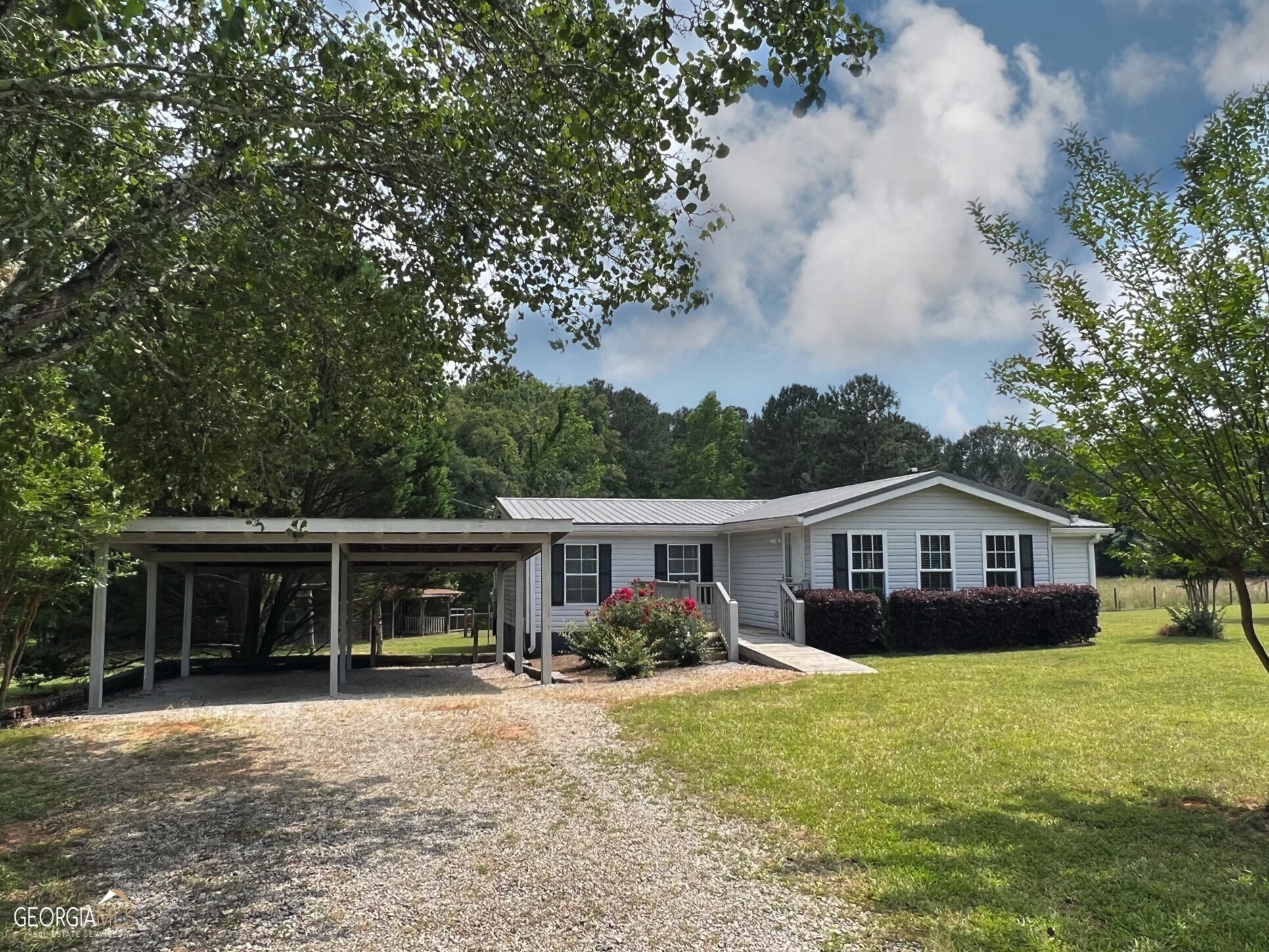 1081 Fraction Bottoms Road Buckhead, GA 30625 - Photo 1 of 1 a view of house with outdoor space and swimming pool