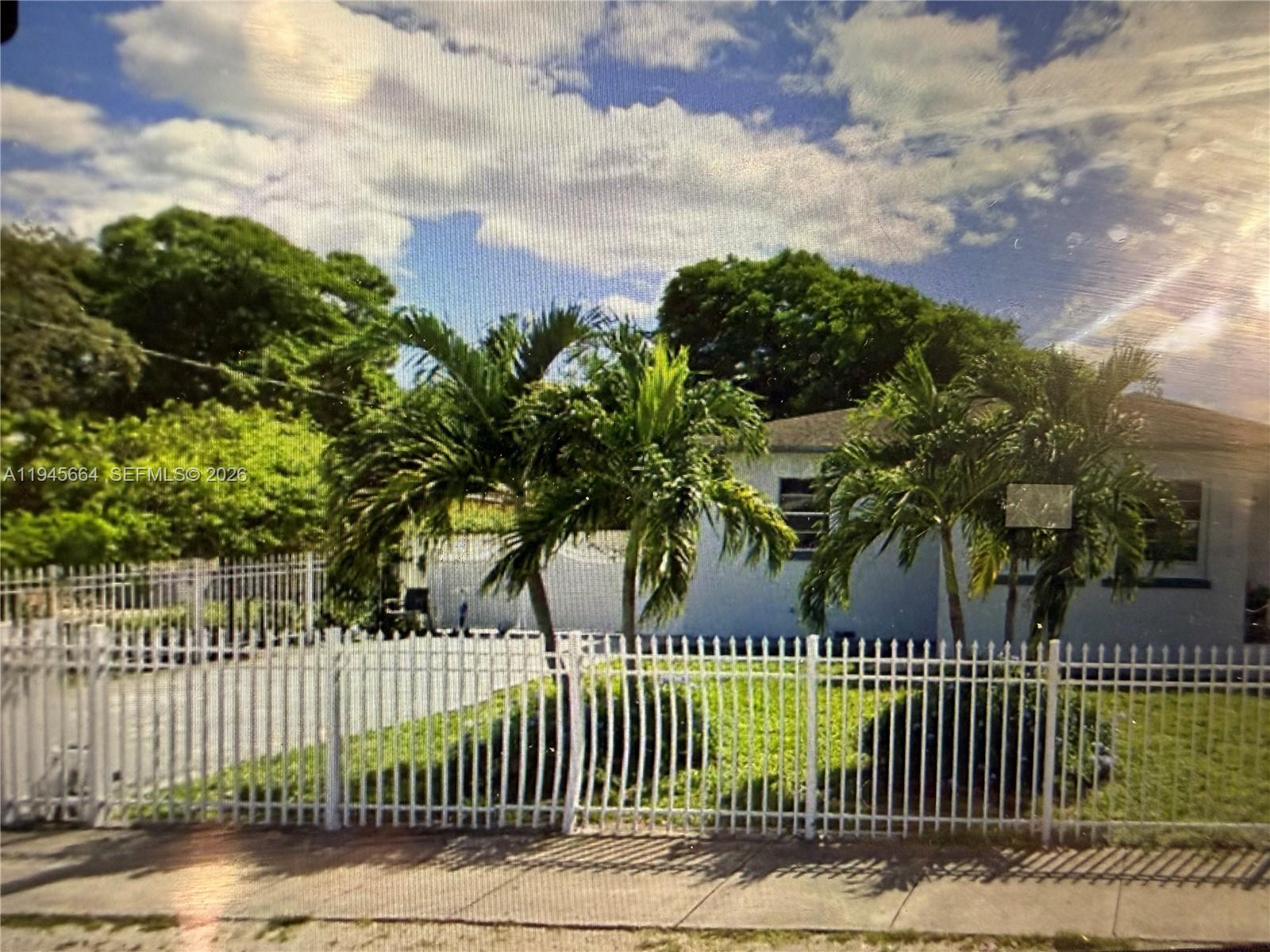 2376 Northwest 104th Street Miami, FL 33147 - Photo 4 of 7 a view of a street from a balcony