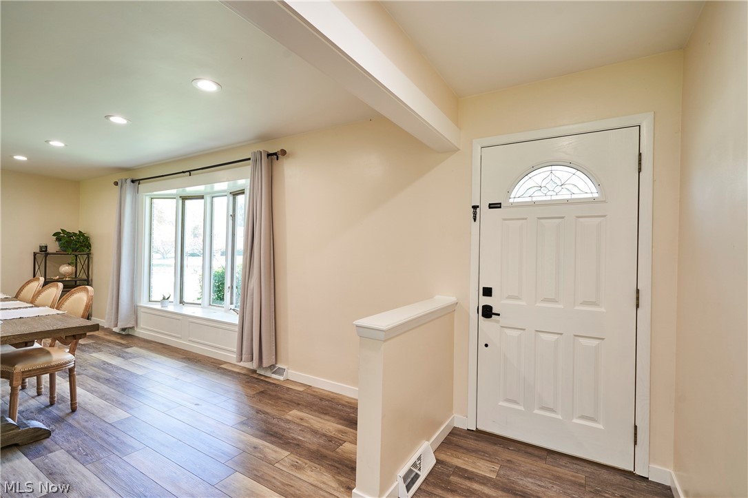 1535 Belle Meade Drive Akron, OH 44321 - Photo 2 of 33 Foyer with newer entry door and LVT flooring