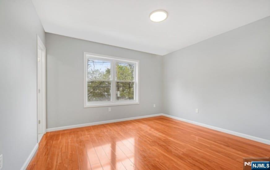 125 Birch Street, Unit 2 Bloomfield, NJ 07003 - Photo 10 of 11 an empty room with a window