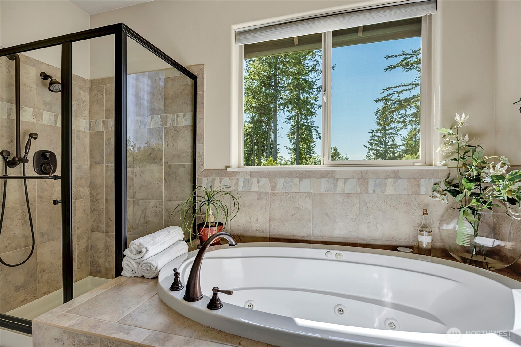8211 Spada Road Snohomish, WA 98290 - Photo 18 of 35 a bathroom with a tub and shower