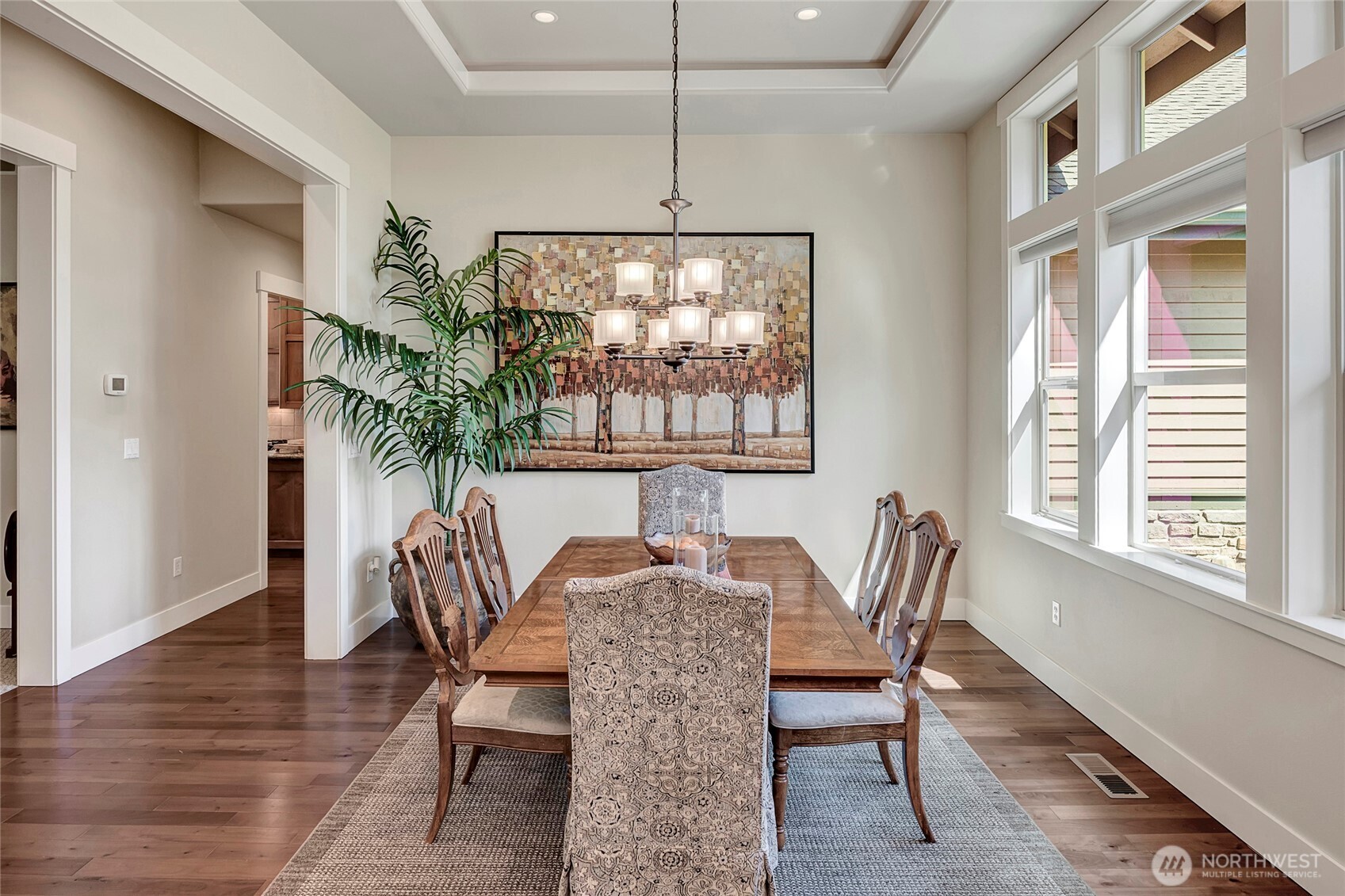 8211 Spada Road Snohomish, WA 98290 - Photo 5 of 35 a view of a dining room with furniture window and wooden floor