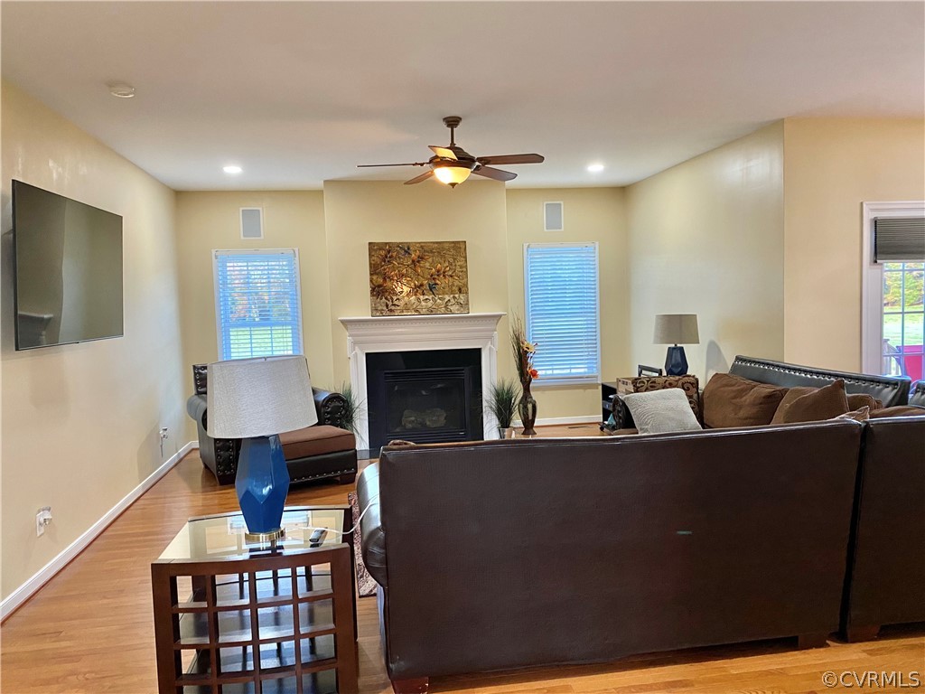 5308 Wellington Ridge Road Henrico, VA 23231 - Photo 9 of 49 Wood flooring and gas fireplace