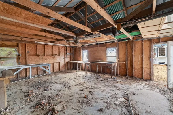 a view of a swimming pool with a yard