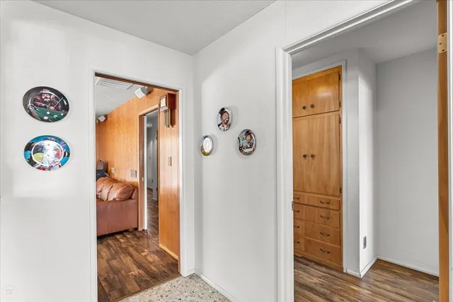 a view of a hallway with elevator and door