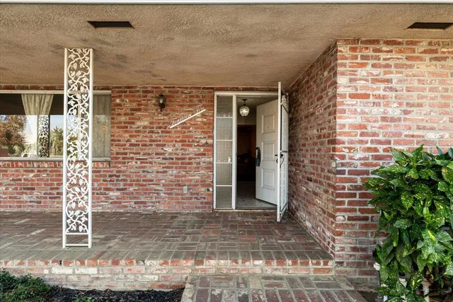 a brick building with a door