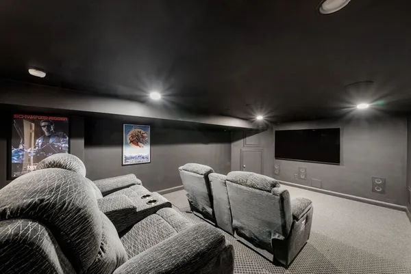 a room with furniture and a flat screen tv